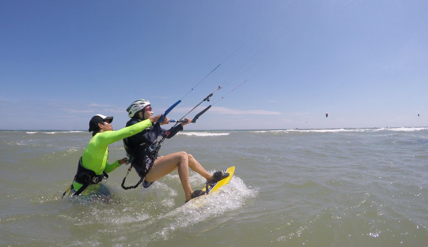 Kitesurfer jumping over the sea at Mui Ne